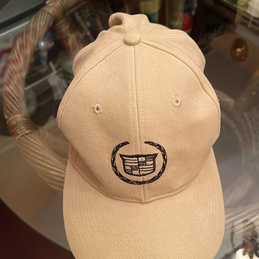 Cadillac emblem, baseball cap. One size fits most preowned condition.